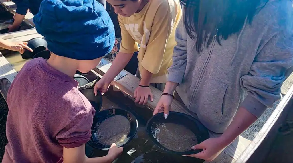 Panning for gold outside of Eagle Mine